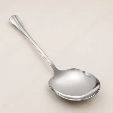 Pair of large black serving spoons